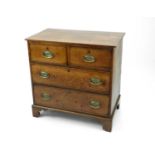 An early 19th century oak chest of drawers, 79cm wide x 48cm deep x 77cm high