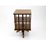 An early 20th century walnut revolving bookcase, 53cm wide x 82cm high