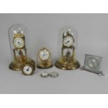 Five various mantel clocks, first half 20th Century, including German rotary pendulum type with