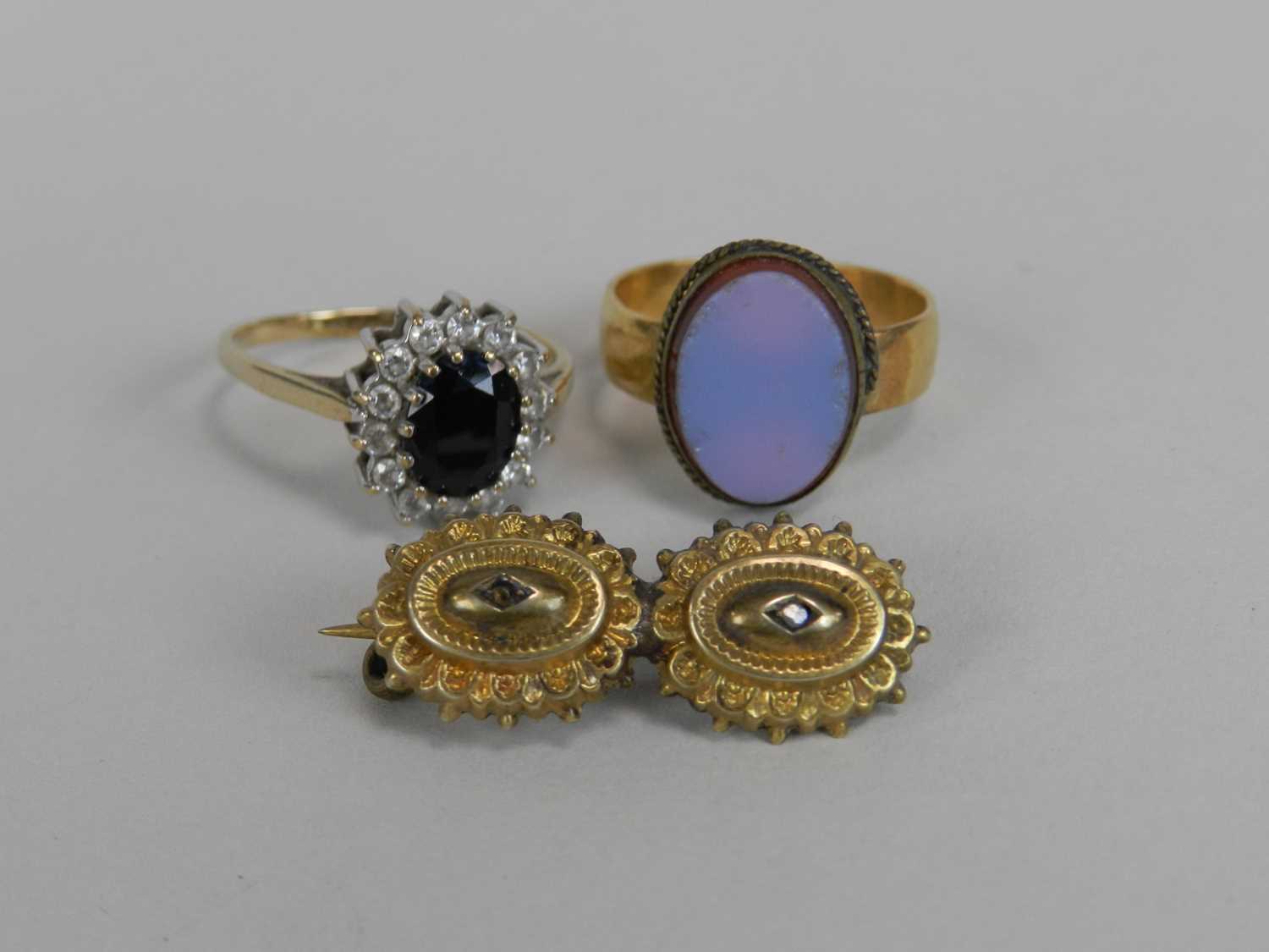 Two rings and a brooch