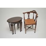 A small mahogany nest of three tables, the largest measuring 52cm high, 58 x 40cm, together with