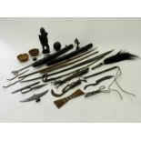 A collection of mainly African tribal art, to include votive figures, arrows, quivers, gourds and