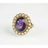 An amethyst and split pearl ring cluster ring