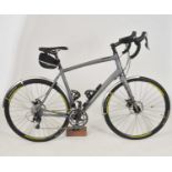 A Fuji Sportif 1.3 disc 2017 road bike, with XL 58cm frame, Shimano 105 group, with accessories to