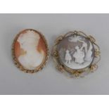 Two oval shell cameo brooches