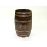 A coopered barrel umbrella stand, in oak with copper banding, 60cm high.