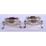 A PAIR OF VICTORIAN SILVER SALTS. London 1875. 4.8 oz. 5.25 cm wide.