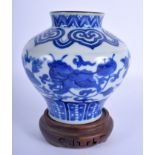 AN 18TH/19TH CENTURY CHINESE BLUE AND WHITE JARLET Qing, painted with Buddhistic lions amongst folia