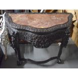 A GOOD 19TH CENTURY CHINESE MARBLE INSET HARDWOOD CONSOLE TABLE carved with figures and foliage. 82