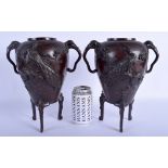 A PAIR OF 19TH CENTURY JAPANESE MEIJI PERIOD TWIN HANDLED BRONZE VASES decorated with birds. 30 cm x