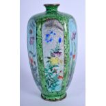 AN UNUSUAL 19TH CENTURY JAPANESE MEIJI PERIOD CLOISONNE ENAMEL VASE decorated with fish and flowers.
