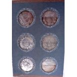 SIX CHINESE WHITE METAL COINS, varying decoration. 3.6 cm wide.