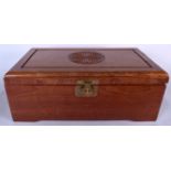 A LARGE CHINESE HARDWOOD BOX, formed with brass fittings. 22 cm x 55 cm.