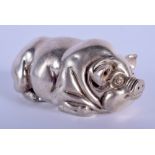 A CONTINENTAL SILVER FIGURE OF A RECUMBENT PIG. 64 grams. 8 cm x 4.5 cm.