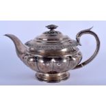 AN EARLY 19TH CENTURY ENGLISH SILVER TEAPOT. London. 23.2 oz. 25 cm wide.