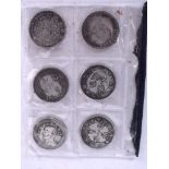 SIX CHINESE WHITE METAL COINS, contained within a plastic wallet. 3.25 cm wide.