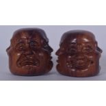 A PAIR OF CHINESE HARDWOOD MULTI FACE BUDDHA, carved with four expressions. 5 cm high.