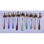 NINE 1950S STERLING SILVER AND ENAMEL SPOONS. (9)