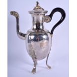 A STYLISH ARTS AND CRAFTS SILVER PLATED COFFEE POT. 29 cm high.