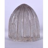 AN ISLAMIC ROCK CRYSTAL CARVING, probably a gaming piece. 3.5 cm high.