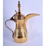 A MIDDLE EASTERN ISLAMIC SILVER GILT EWER. 36 oz. 31 cm high.