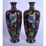 A PAIR OF 19TH CENTURY JAPANESE MEIJI PERIOD LOBED CLOISONNE ENAMEL VASES decorated with flowers. 20