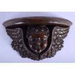 AN 18TH/19TH CENTURY CONTINENTAL CARVED WOOD WALL BRACKET. 33 cm x 23 cm.