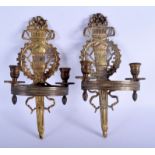 A PAIR OF 19TH CENTURY FRENCH BRASS EMPIRE STYLE SCONCES. 30 cm x 15 cm.