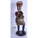 A RARE LARGE ANTIQUE SCOTTISH TOBACCO SHOP DISPLAY FIGURE modelled as a tartan wearing male pinching