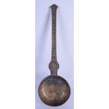 A 19TH CENTURY MIDDLE EASTERN AFGHAN BRASS MEASURING SPOON. 38 cm long.
