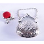 A SILVER PURSE and a silver pin cushion. (2)