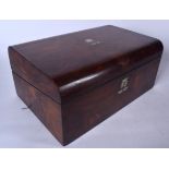 A VICTORIAN WOODEN WRITING SLOPE BOX, decorated with mother of pearl cartouche. 16 cm x 35 cm.