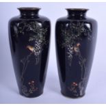 A FINE PAIR OF EARLY 20TH CENTURY JAPANESE MEIJI PERIOD CLOISONNE ENAMEL VASES decorated with birds