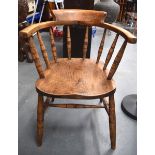 AN OAK SMOKERS CHAIR. 79 cm x 55 cm.