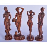 A SET OF FOUR CONTINENTAL CARVED WOOD FIGURES OF NUDE FEMALES. 21 cm high. (4)