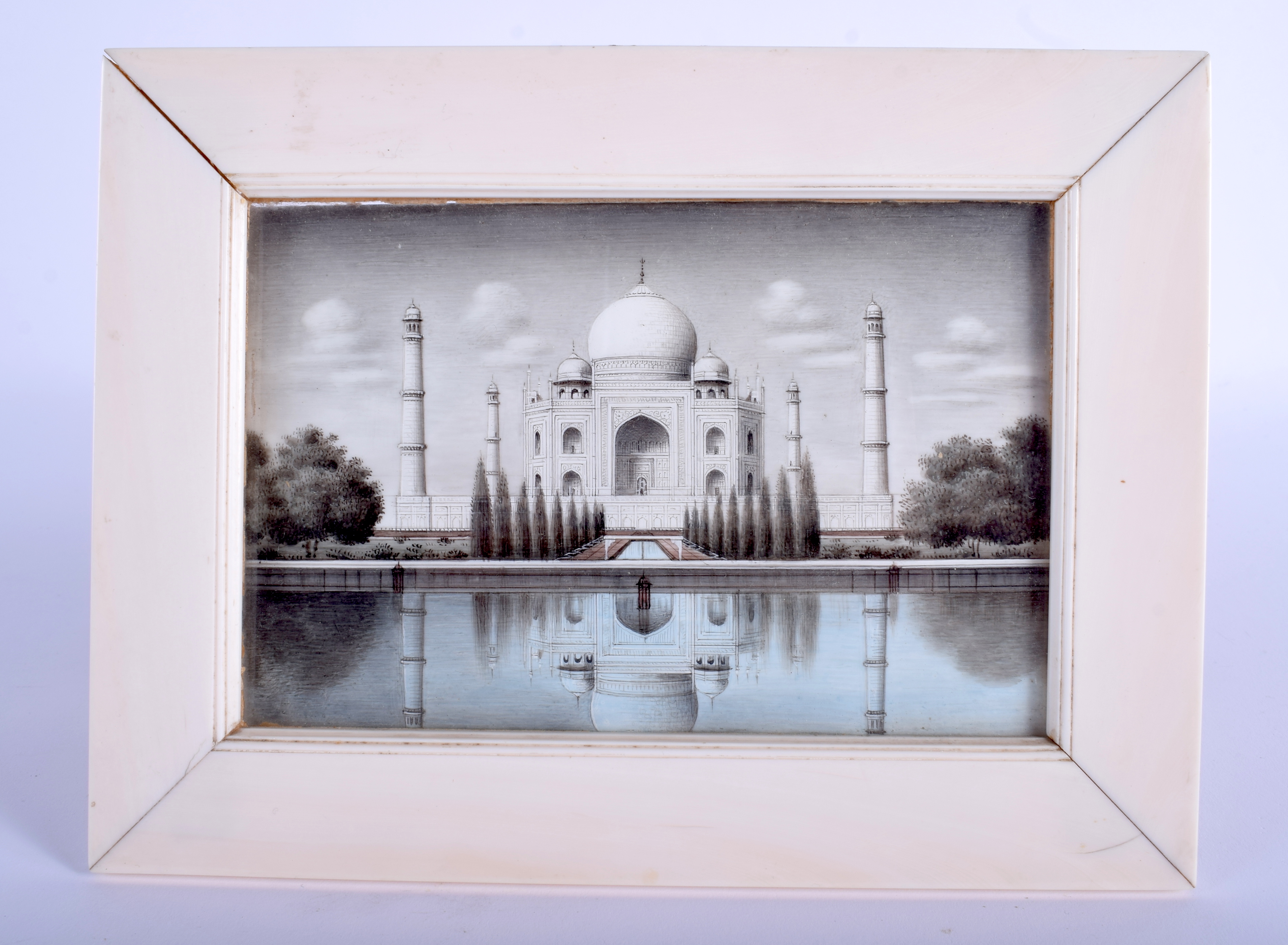 A FINE 19TH CENTURY INDIAN CARVED IVORY TAJ MAHAL MINIATURE within an ivory frame. 21 cm x 16.5 cm.