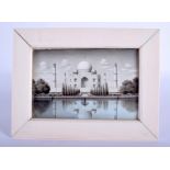 A FINE 19TH CENTURY INDIAN CARVED IVORY TAJ MAHAL MINIATURE within an ivory frame. 21 cm x 16.5 cm.