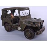 A VINTAGE TOY ARMY TRUCK, with associated figure. 39 cm long.