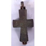 A BRONZE DOUBLE CROSS PENDANT, decorated with a saint. 10.5 cm long.