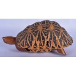 A VINTAGE CONTINENTAL CARVED PARQUETRY TORTOISE BOX AND COVER. 24 cm wide.