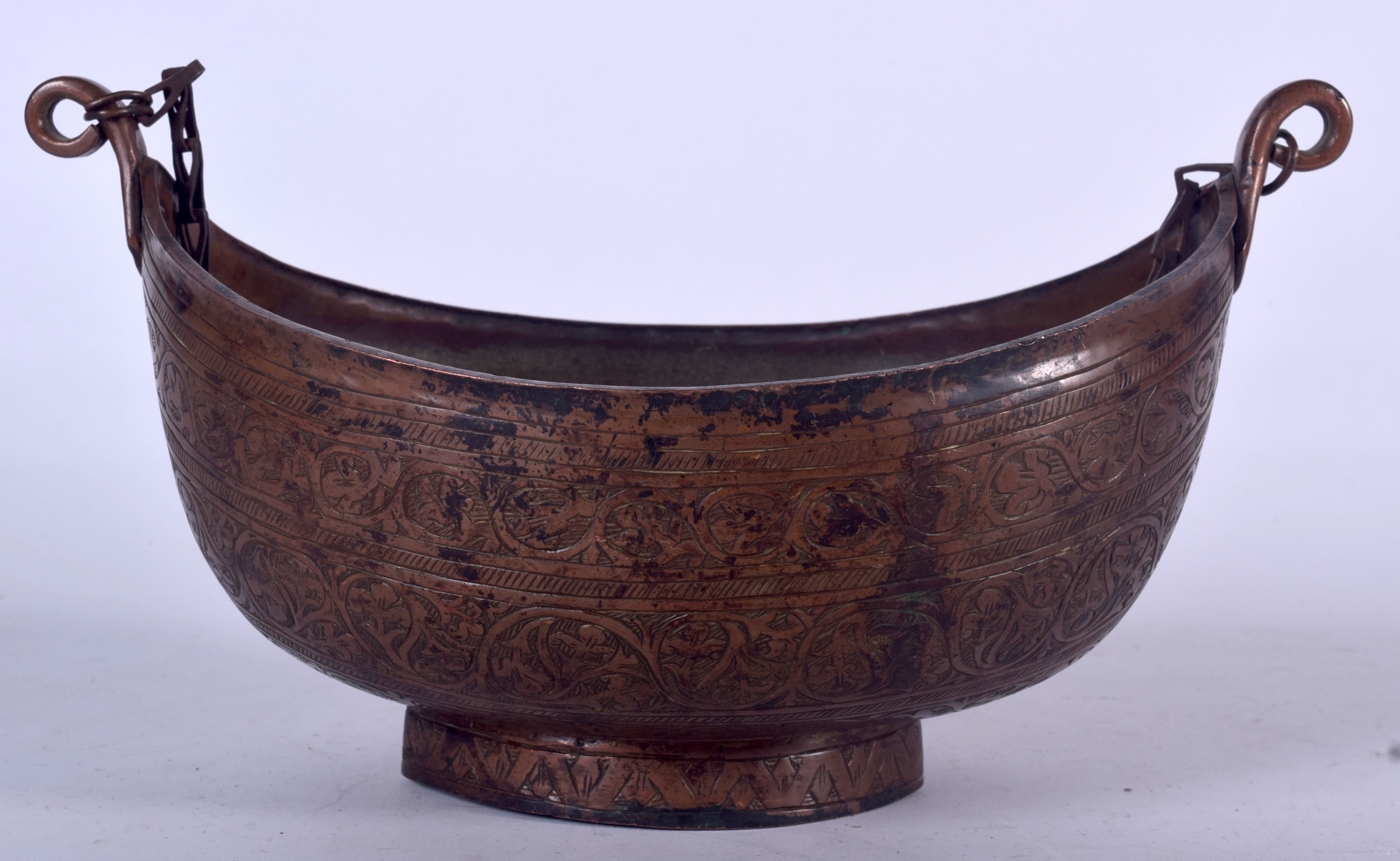 A 19TH CENTURY EASTERN COPPER HANGING BOWL, decorated with foliage. 14.5 cm x 26 cm.