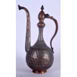 A LARGE SILVERED ISLAMIC COPPER EWER, decorated with panels of foliage. 38.5 cm high.