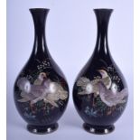 A PAIR OF 19TH CENTURY JAPANESE MEIJI PERIOD CLOISONNE ENAMEL VASES decorated with birds. 19 cm high