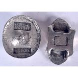 TWO CHINESE WHITE METAL INGOTS, varying form, weight 345 grams. Largest 6.5 cm wide.
