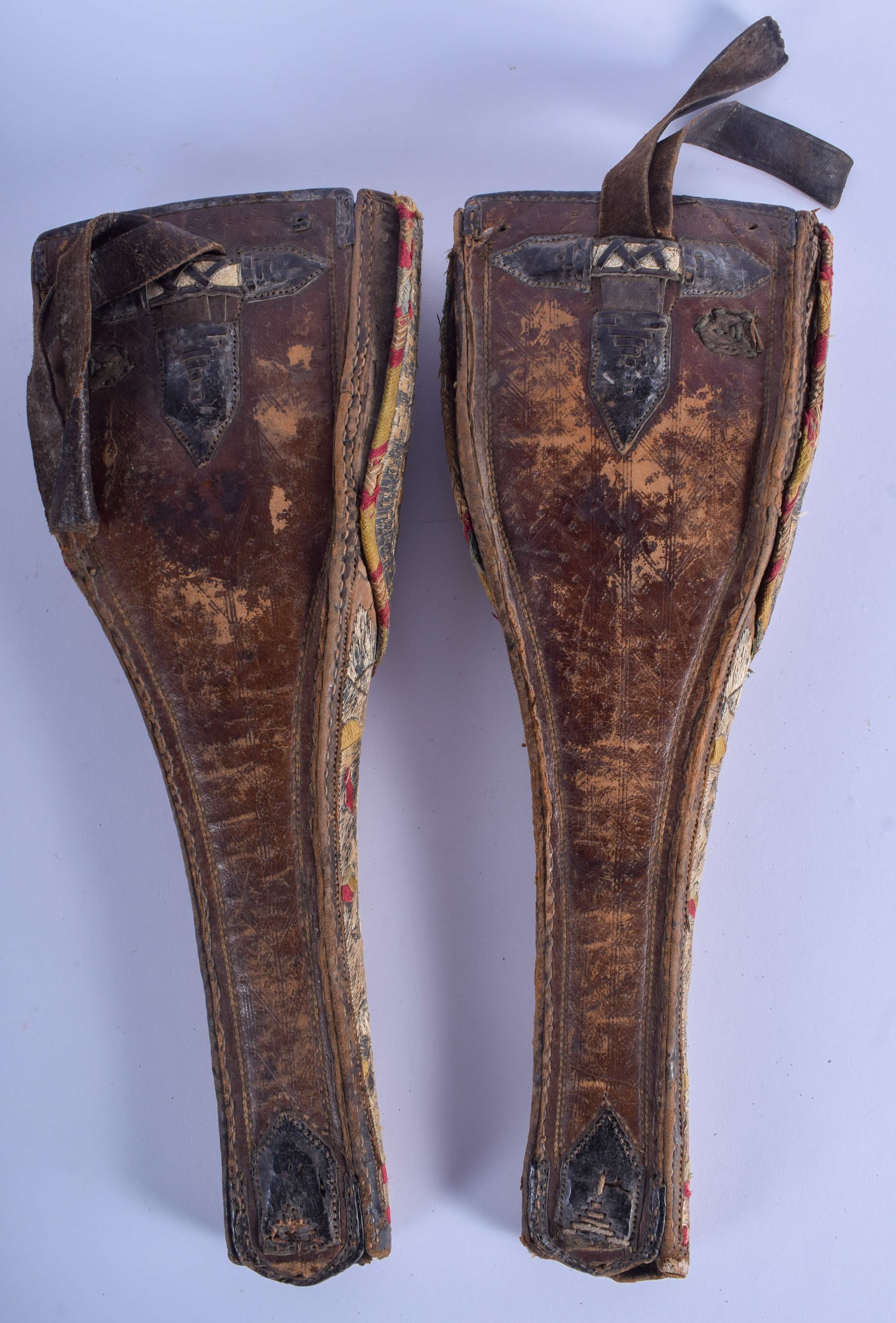 A PAIR OF 19TH CENTURY TURKISH OTTOMAN GUN CASES decorated with yellow and red motifs. 40 cm x 15 cm