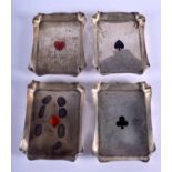 A RARE SET OF FOUR ART DECO SILVER AND ENAMEL CARD TRAYS. 260 grams. 9 cm x 7 cm. (4)