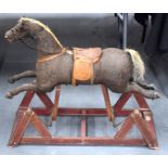 AN ANTIQUE CHILD ROCKING HORSE. 79 cm x 87 cm.