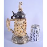 A SMALLER 18TH/19TH CENTURY CONTINENTAL CARVED IVORY TANKARD STEIN decorated in relief with classica