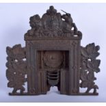 A VICTORIAN APPRENTICE CAST IRON FIRE PLACE. 30 cm x 22 cm.