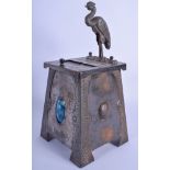 AN ARTS AND CRAFTS SILVER PLATED COPPER RUSKIN CIGARETTE DISPENSER formed with a stork. 28 cm high.